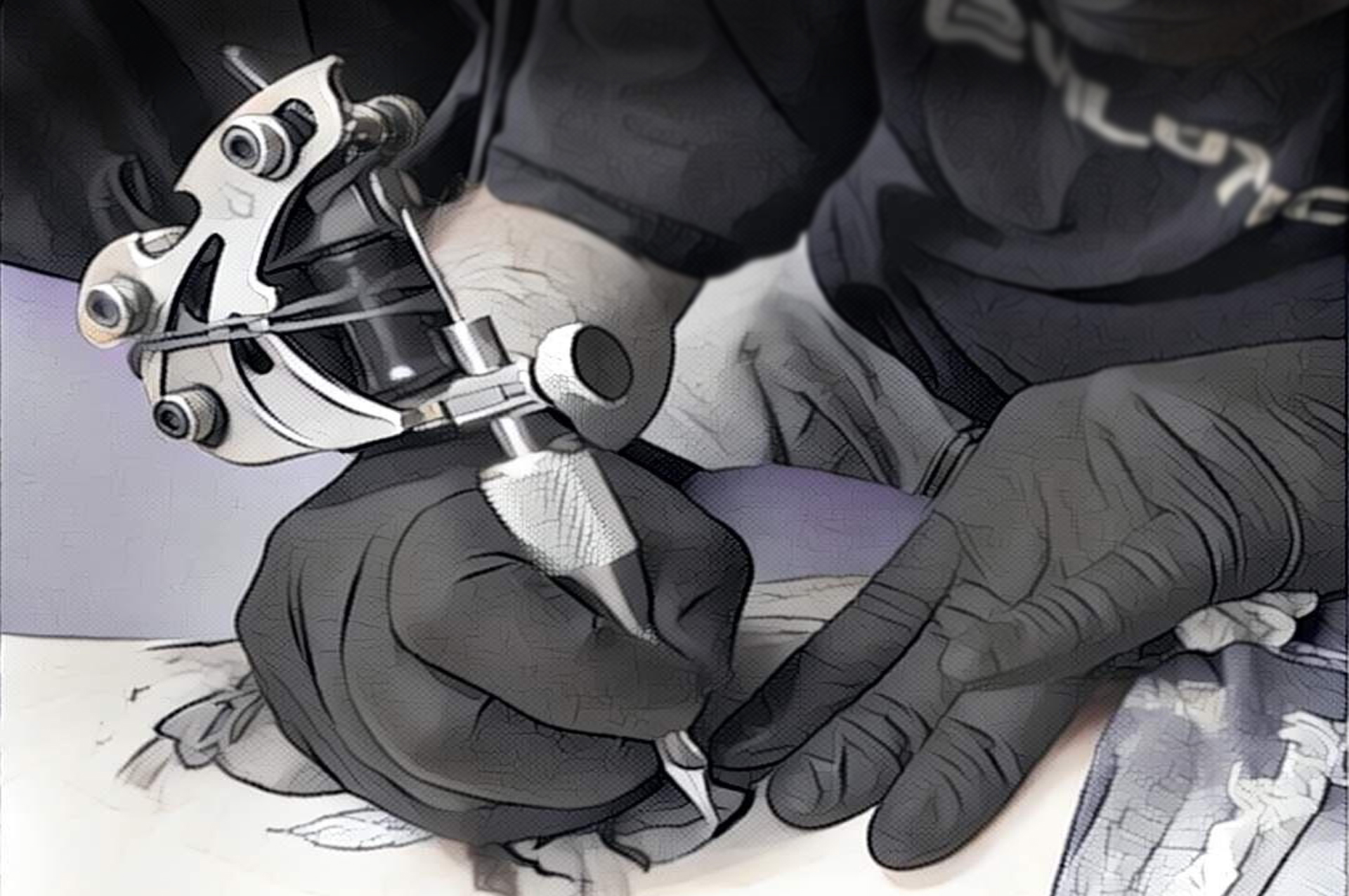 Tattoo artist applying ink
